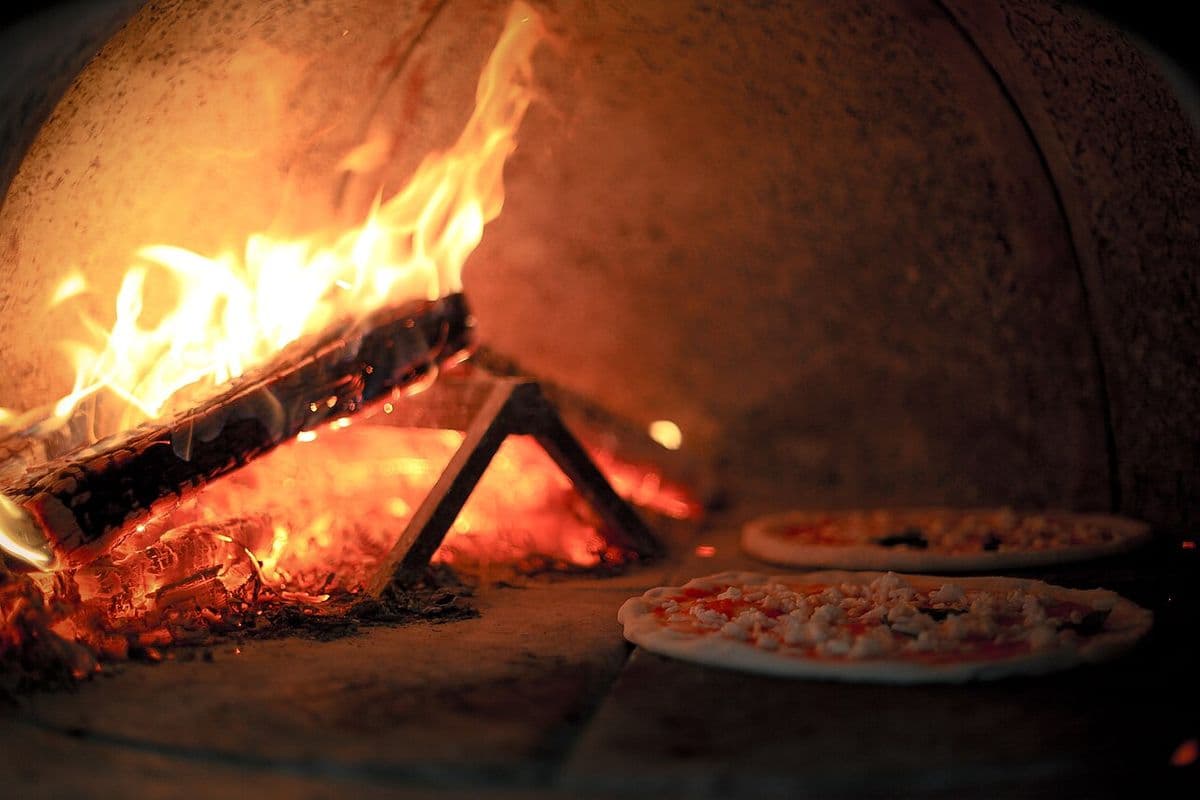 How to Cook Pizza in a Wood-Fired Oven